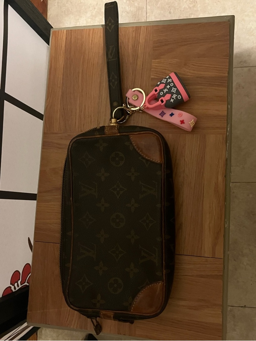 Louis Vuitton Brown Monogram Clutch with Pink Charm